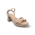 A nude platform sandal with a block heel and ankle strap.