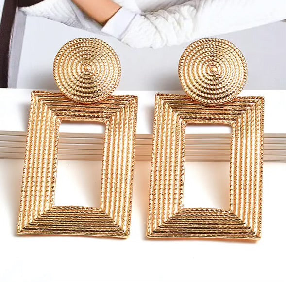Kim C’s Gold Square Earrings