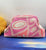 Orange/Pink Pastel Knit Clutch