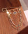Gold Evil Eye Chain Pin