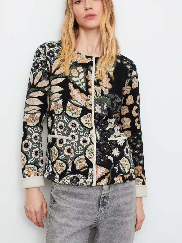 Woman wearing a floral patterned cardigan