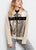 A metallic and beige jacket 