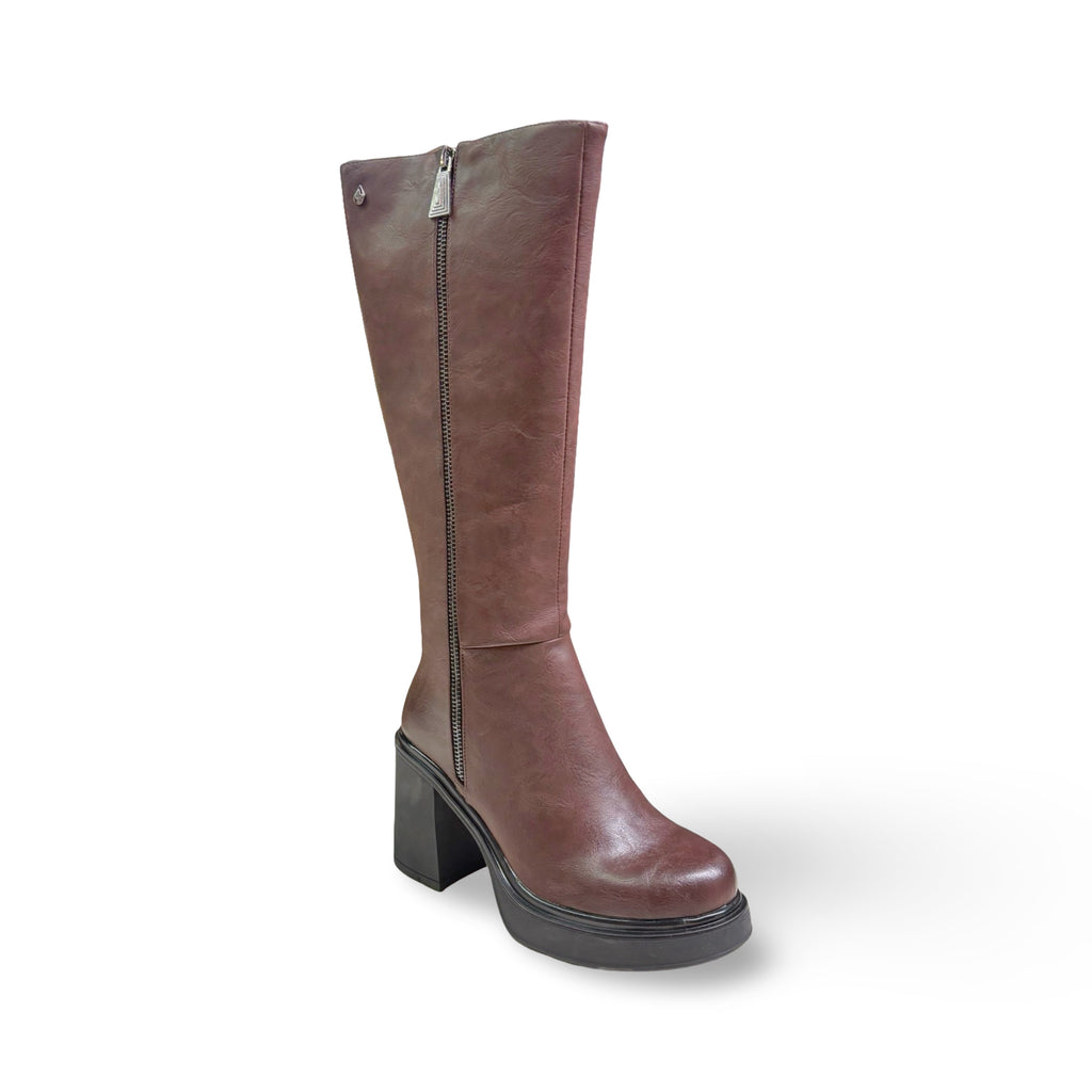 Brown knee-high boot with a platform sole 