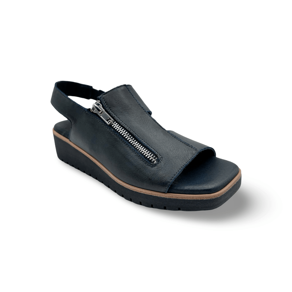 Navy colored platform sandal with an open toe and slingback strap, featuring a side zipper