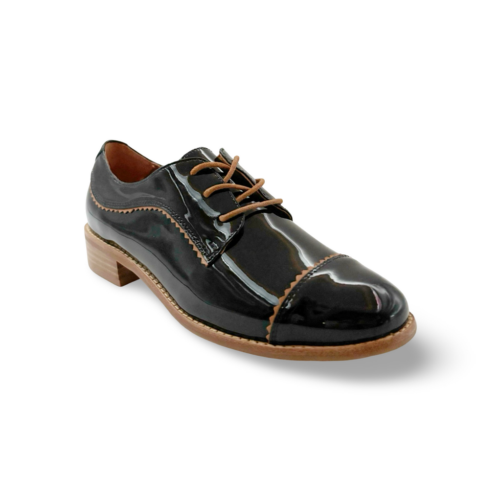 Black patent leather shoe with brown laces 