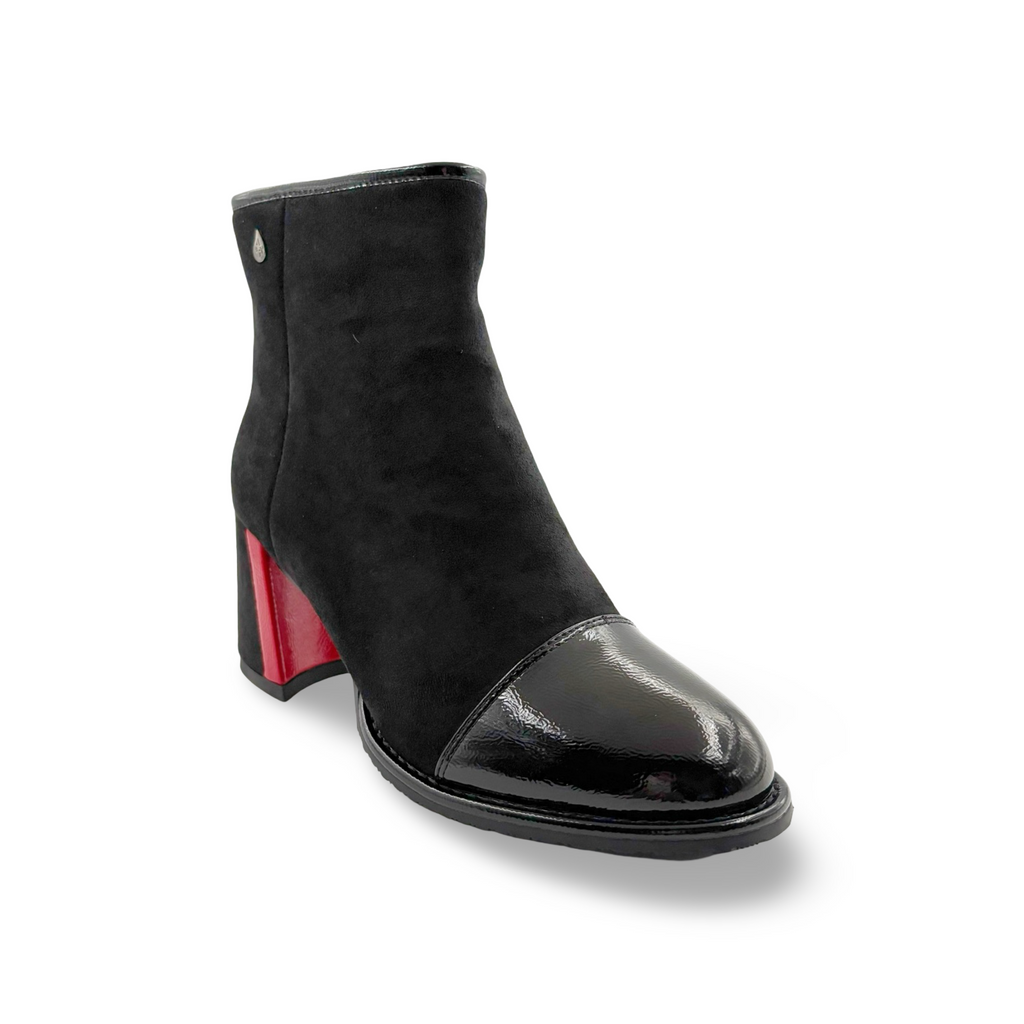 Black ankle boot with a red heel 