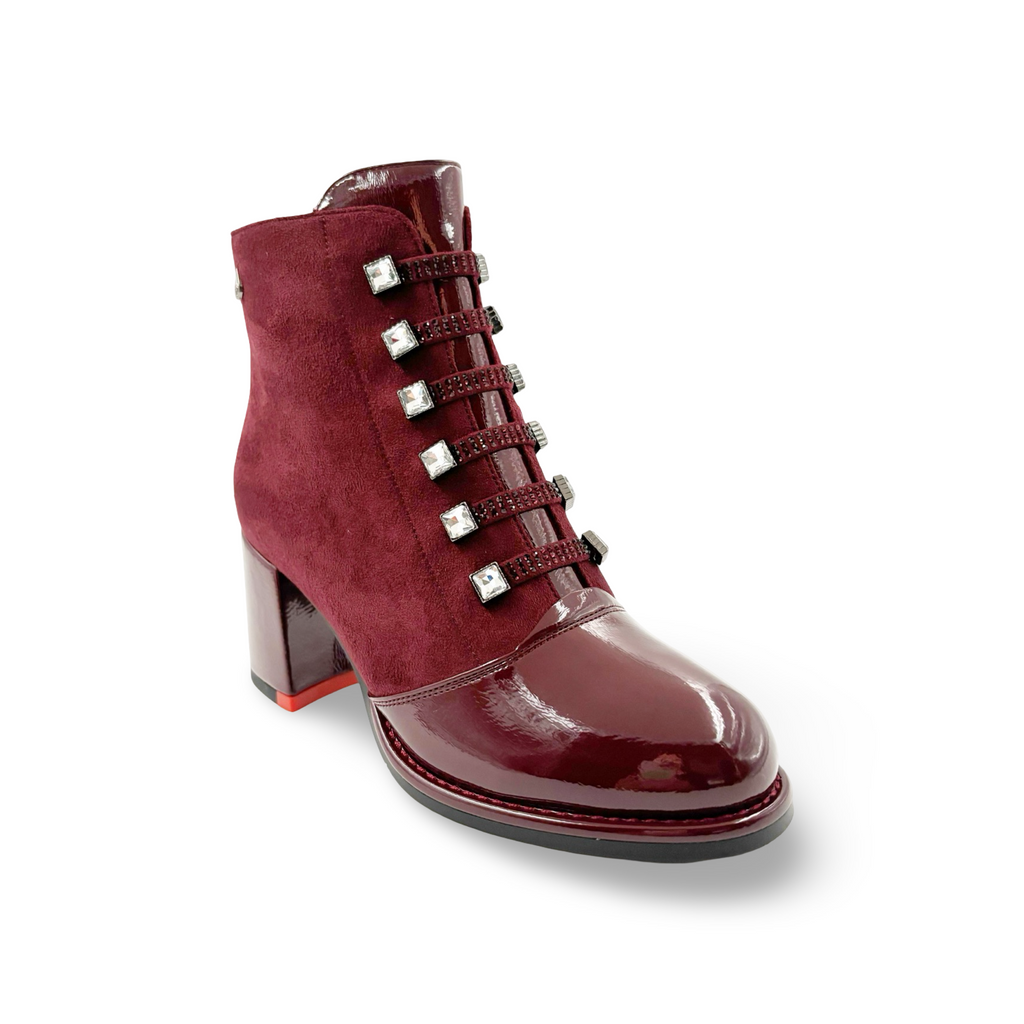 Burgundy ankle boot with decorative straps 