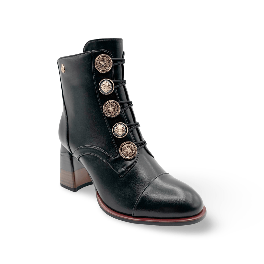 Black boot with decorative buttons