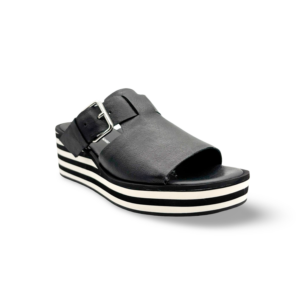 Black sandal with black and white wedge sole 
