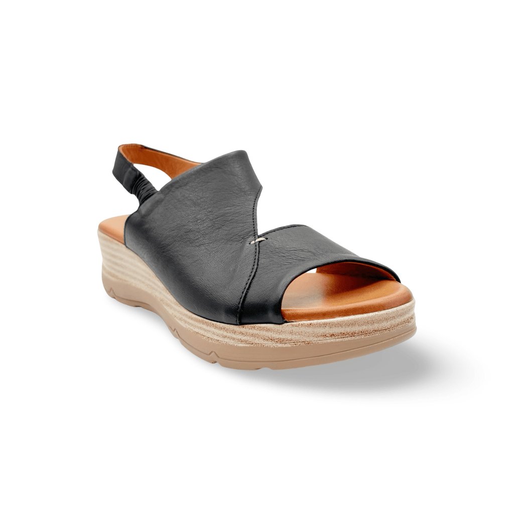 Black leathersandal with light tan sole 