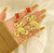 Ruby and Gold Ornate Earrings