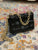 PBGJ31A-01 Black Leather Cross Woven Clutch Bag with Gold Chain